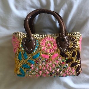 Small embroidered straw bag